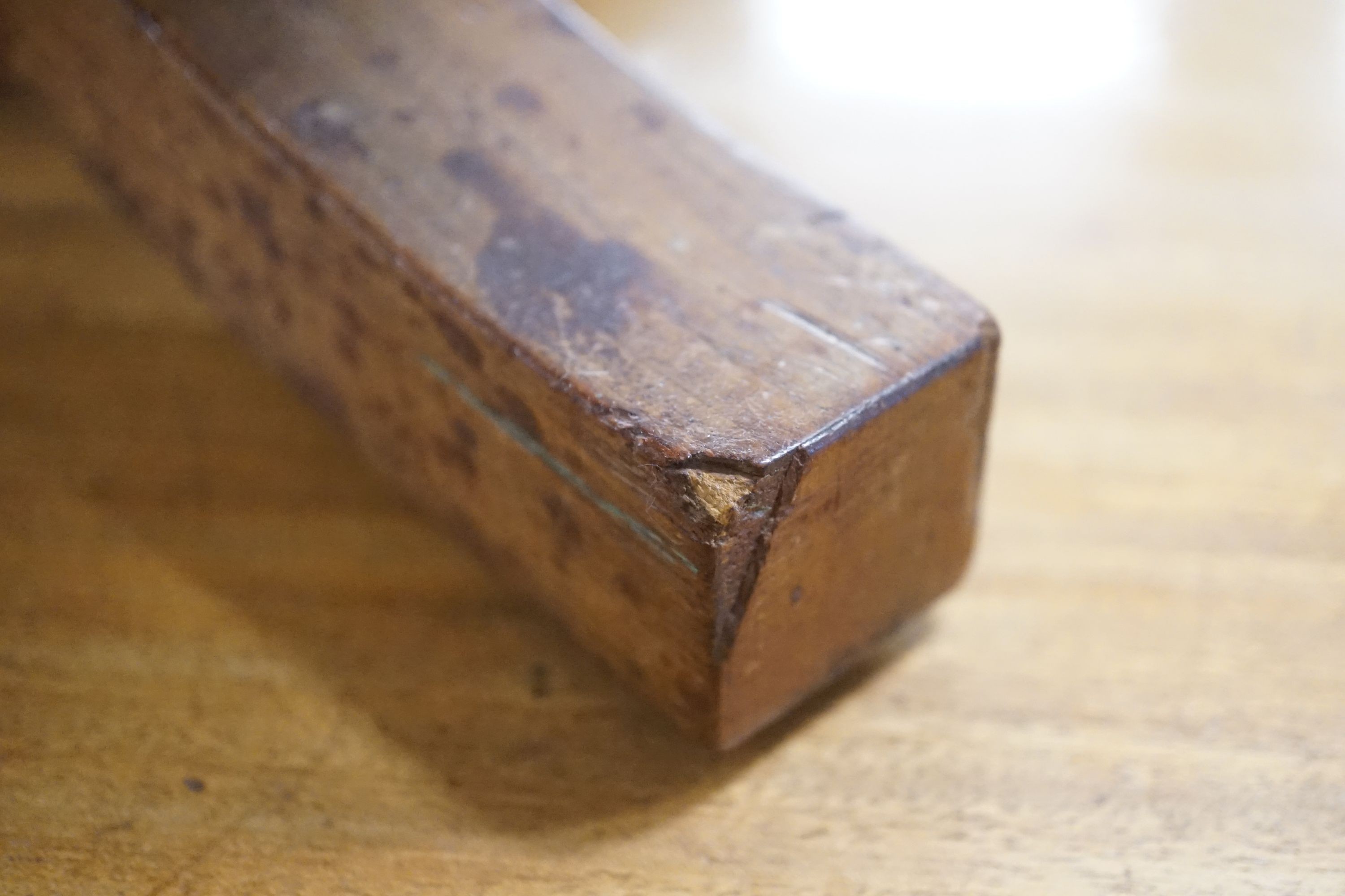 A miniature mahogany tablet-topped table, width 56cm depth 40cm height 38cm